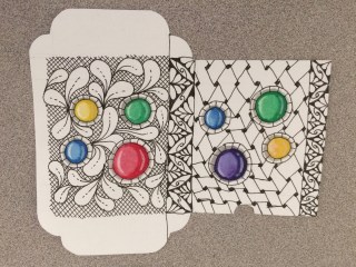 Tuckbox decorated but not yet folded Tuckbox decorated Zentangle style with painted gems but not folded yet