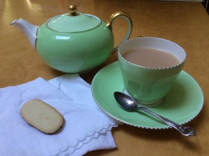 Teapot and cup in Wedgwood pale green china