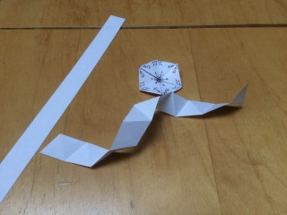 strip of paper folded ready for making a hexahexaflexagon