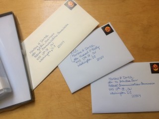 Hand addressed envelopes to commissioners of the FCC