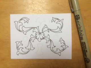 Acanthus scrolls inked over pencil guidelines on card