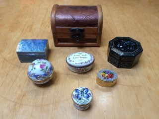 assorted decorative boxes, some enameled, some inlaid, one painted ceramic