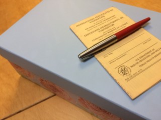 Photo includes cover of international vaccinations certificate from the 1970s.