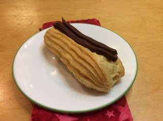 Homemade lemon eclair with chocolate glaze