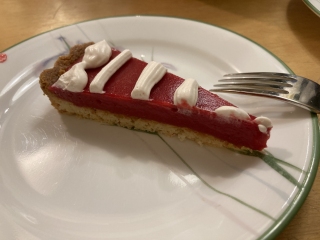 Slice of cranberry curd tart