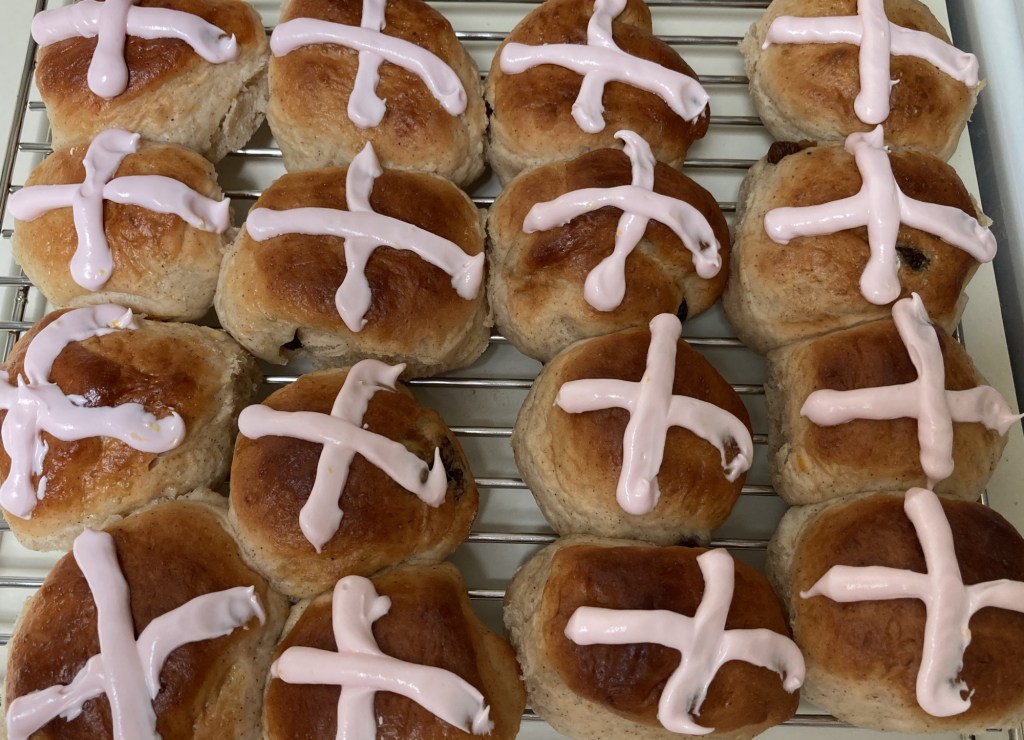Hot cross buns with royal icing while it is still firm, before excess moisture in the bun makes it runny.